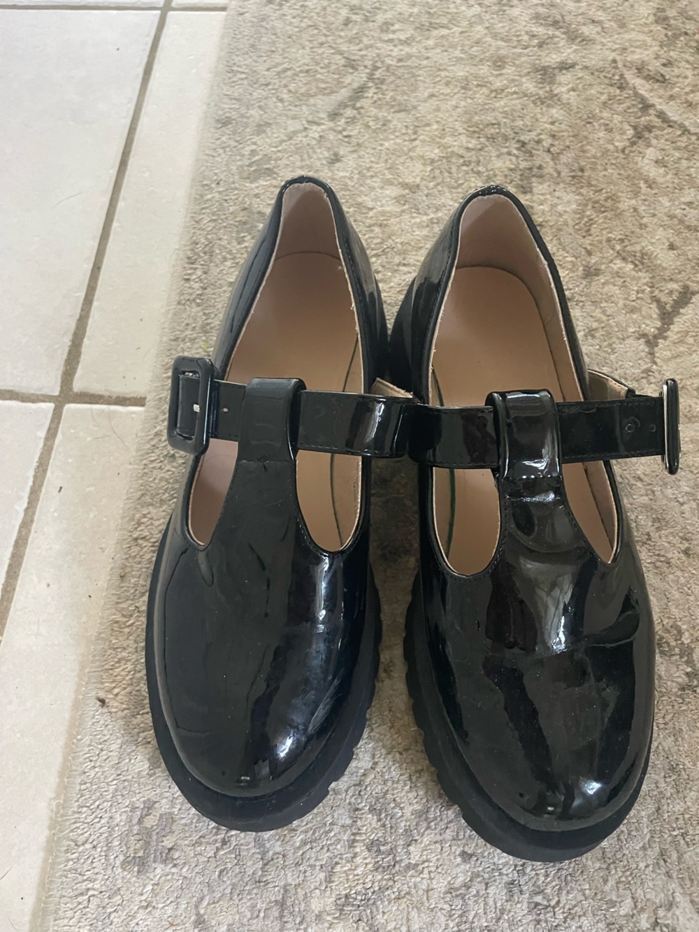 Doc Martens look like. Black patent shoes.